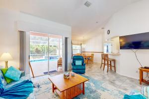 a living room with a couch and a table at 1295 Barber St in Sebastian