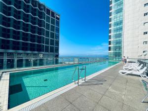 a swimming pool on the roof of a building at Sun Cloud Hotel in Busan