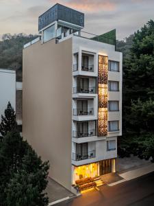 an image of a hotel with a building at Country Inn Smart Stays, Rishikesh at Tapovan in Rishīkesh