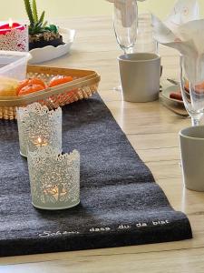 a table with a black table cloth on a table at Ferienhaus Ruth in Walow
