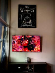 a painting on the wall of a room at Private Luxury Loft in Crescenzago +18 photos