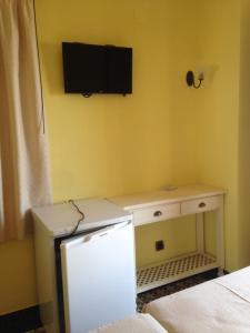 TV a/nebo společenská místnost v ubytování Hostal Aranda