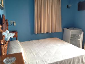 Postel nebo postele na pokoji v ubytování Hostal Aranda