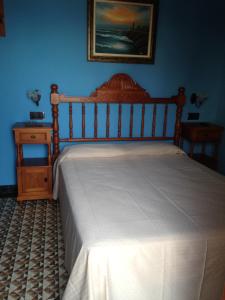 Postel nebo postele na pokoji v ubytování Hostal Aranda
