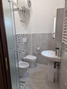 a small bathroom with a toilet and a sink at Dimore Rosantò 2 in Palombaro +22 photos