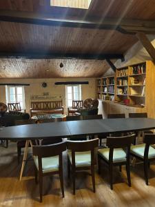 a large dining room with a large table and chairs at Chez Bobby in Montréal