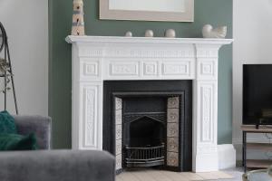 a living room with a fireplace with a tv at Spacious! 6BR in Beach Road in South Shields +58 photos