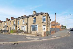 a brick house on the corner of a street at New! 4BR in Durham Road in Annfield Plain