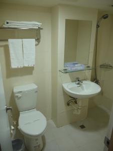 Koupelna v ubytování Ing Wang Hotel