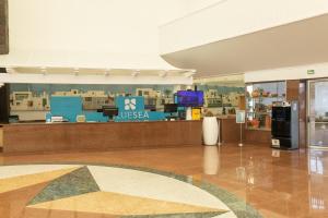 a lobby of a museum with a store at BLUESEA Costa Bastian in Costa Teguise