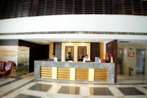Vestíbul o recepció de Clarion Inn Stella