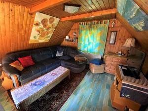an overhead view of a living room with a couch at Ferienhaus Deubel Escobar in Kappeln
