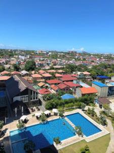an overhead view of a resort with a swimming pool at Ohhlala Cozy Corner at Royal Oceancrest Mactan in Mactan Island