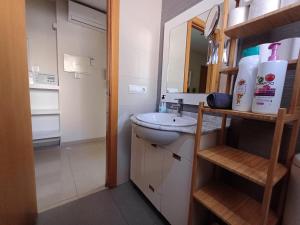 a bathroom with a sink and a mirror at ÁTICO HOME y Garaje, Algemesi Home in Algemesí +14 photos