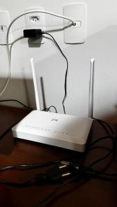 a nintendo wii game system sitting on a table at Apartamento Melbela IV AP 41 in Espirito Santo Do Pinhal