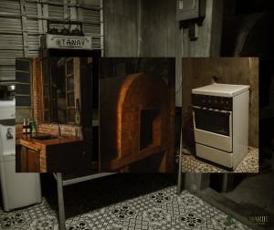 a kitchen with a brick oven and a stove at Zen Marie Tanay in Sampong