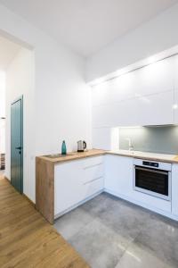 Küche/Küchenzeile in der Unterkunft Apartment on Dauksos 18