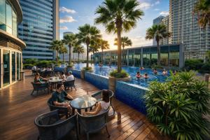 a rendering of a rooftop pool at a hotel at KL Suites Apartment At Vortex in Kuala Lumpur