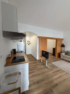 a kitchen with a sink and a counter top at Casa & Caminho AL in Velas