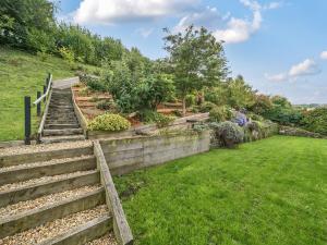 a set of stairs leading up to a garden at Blackthorn House in Blandford Forum