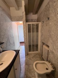 a bathroom with a toilet and a sink at Villa Riviera in Mira +38 photos