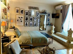 a bedroom with a bed and a mirror on the wall at Villa Basilicata in Pedale +30 photos
