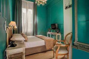 A bed or beds in a room at The B Place