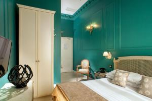A bed or beds in a room at The B Place