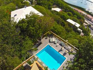 an overhead view of a swimming pool at a resort at Marina Vista St. Thomas in Nazareth