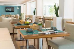 Χώρος καθιστικού στο Hotel Prestigio