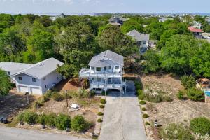 an aerial view of a house with a driveway at Pelican Perch in Duck
