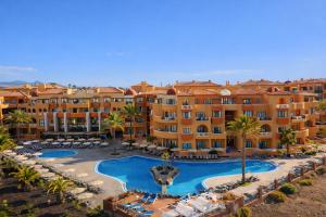 an aerial view of a resort with a swimming pool at Grand Muthu Golf Plaza Hotel & Spa in San Miguel de Abona