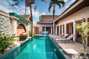an image of a swimming pool in a villa at Prima Villas Chalong Phuket in Chalong