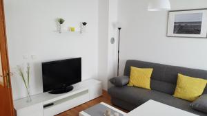 En TV eller et underholdningssystem på Apartment Roko