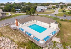 an overhead view of a swimming pool on a house at Central OBX Getaway with Pool and Sound Access in Nags Head
