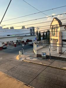 a large boat is parked at a gas station at Casa Bohemia in Ciudad Guzmán