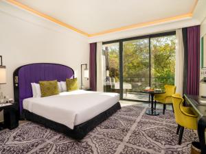 a hotel room with a bed and a desk at STORY Rabat in Rabat