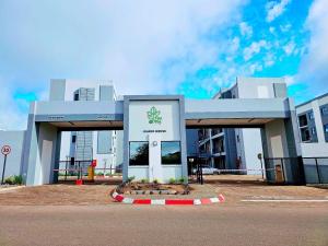 a building with a sign in front of it at The Kgale Luxe in Gaborone