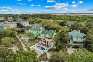 an aerial view of a house with a pool at Rising Sun OBX in Corolla