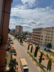 a view of a city street with cars and buildings at Egel Appartement in Yaoundé