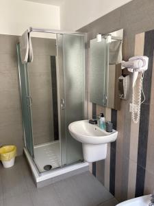 a bathroom with a shower and a sink at La Regina Di Saba in Piazza Armerina