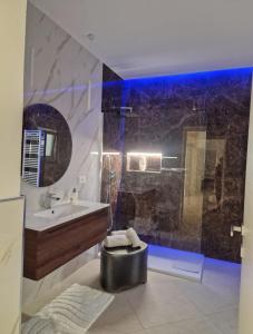 a bathroom with a sink and a shower at Home Belvedere in Brindisi +29 photos