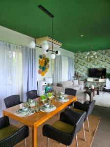 a living room with a table and chairs at Amazing Villa Best View in Boracay