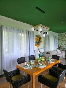 a dining room with a table and chairs at Amazing Villa Best View in Boracay +26 photos