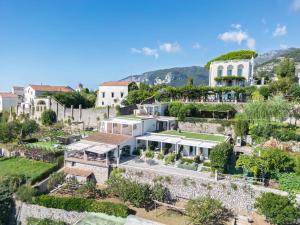 an aerial view of a village with houses and trees at Villa Amore Amalfi Coast in Ravello