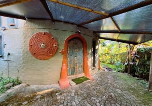 a door on the side of a house at The Storybook Nook in Kaapsehoop +7 photos