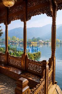 a gazebo with a view of the water at Imperial Group of Houseboats in Srinagar