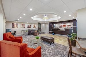 a lobby with couches and chairs and a table at Best Western Lumberton in Lumberton