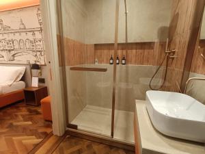 a bathroom with a shower and a sink at Aria Domus in Lastra a Signa +64 photos