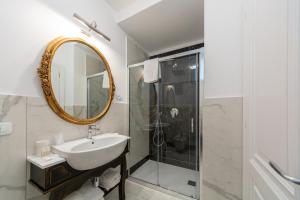 a bathroom with a sink and a mirror at Villa Amore Amalfi Coast in Ravello +93 photos